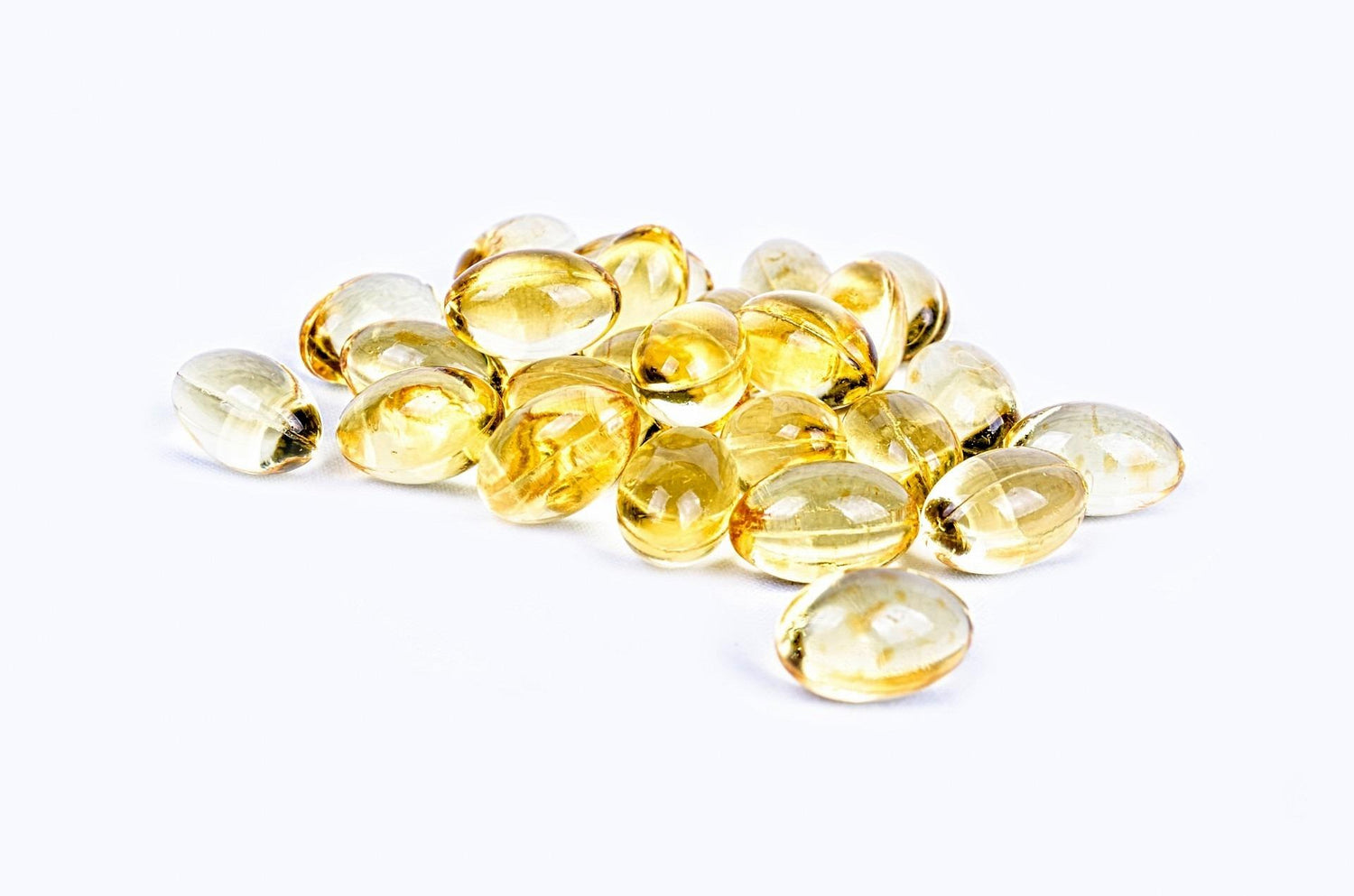 Premium pet health capsules oval and rounded in shape light golden in colour